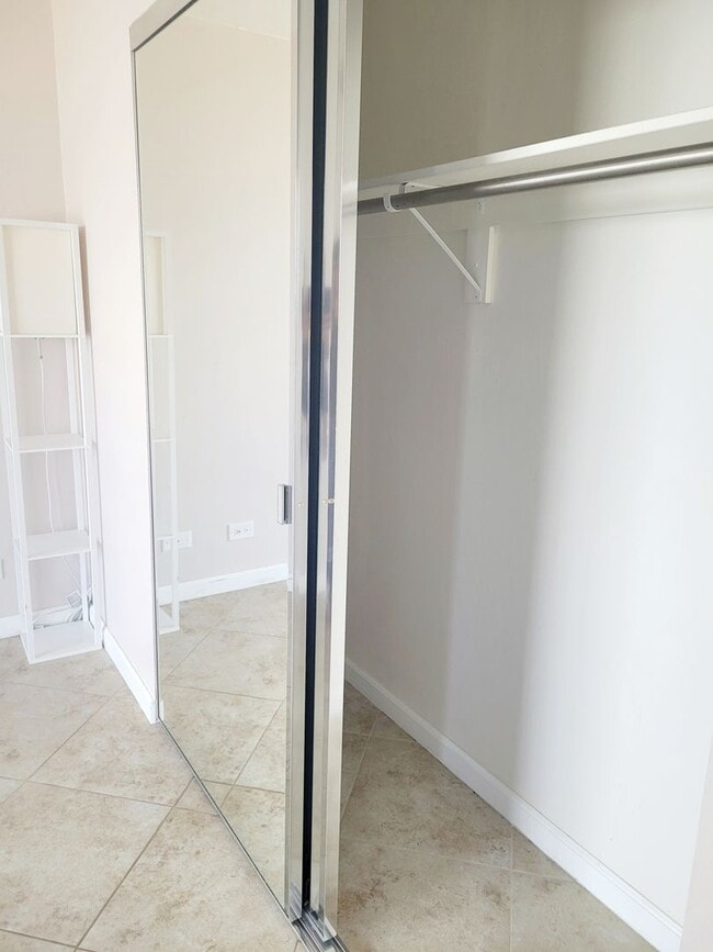 Building Photo - AVAILABLE | 2 Bedroom, 1 Bathroom Condo with 1 Assigned Parking Stall