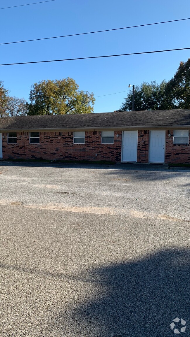 Building Photo - WoodCreek Apartments