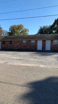 Building Photo - WoodCreek Apartments