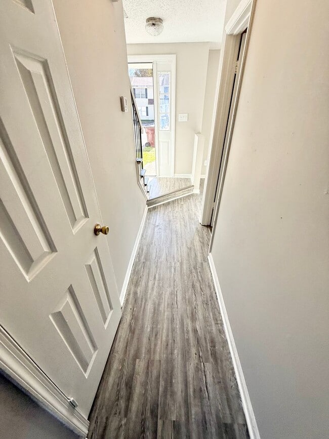 Building Photo - *** RENT READY!! Newly remodeled townhome! ALL Laminate.