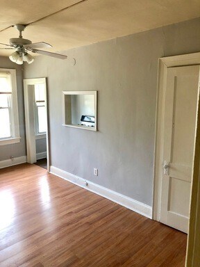Studio Living Room and Pass Thru into Kitchen - Randolph Apartments