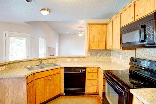 Building Photo - Available July | 4-bedroom 2 bath home in ...