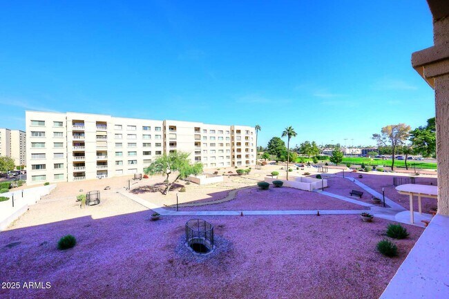 Building Photo - 7910 E Camelback Rd