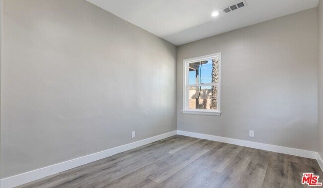 Building Photo - 9217 Langdon Ave