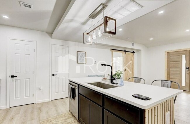 Building Photo - 4 Bedroom Home with 2.5 Bathrooms on a Corner Lot near Plaza District