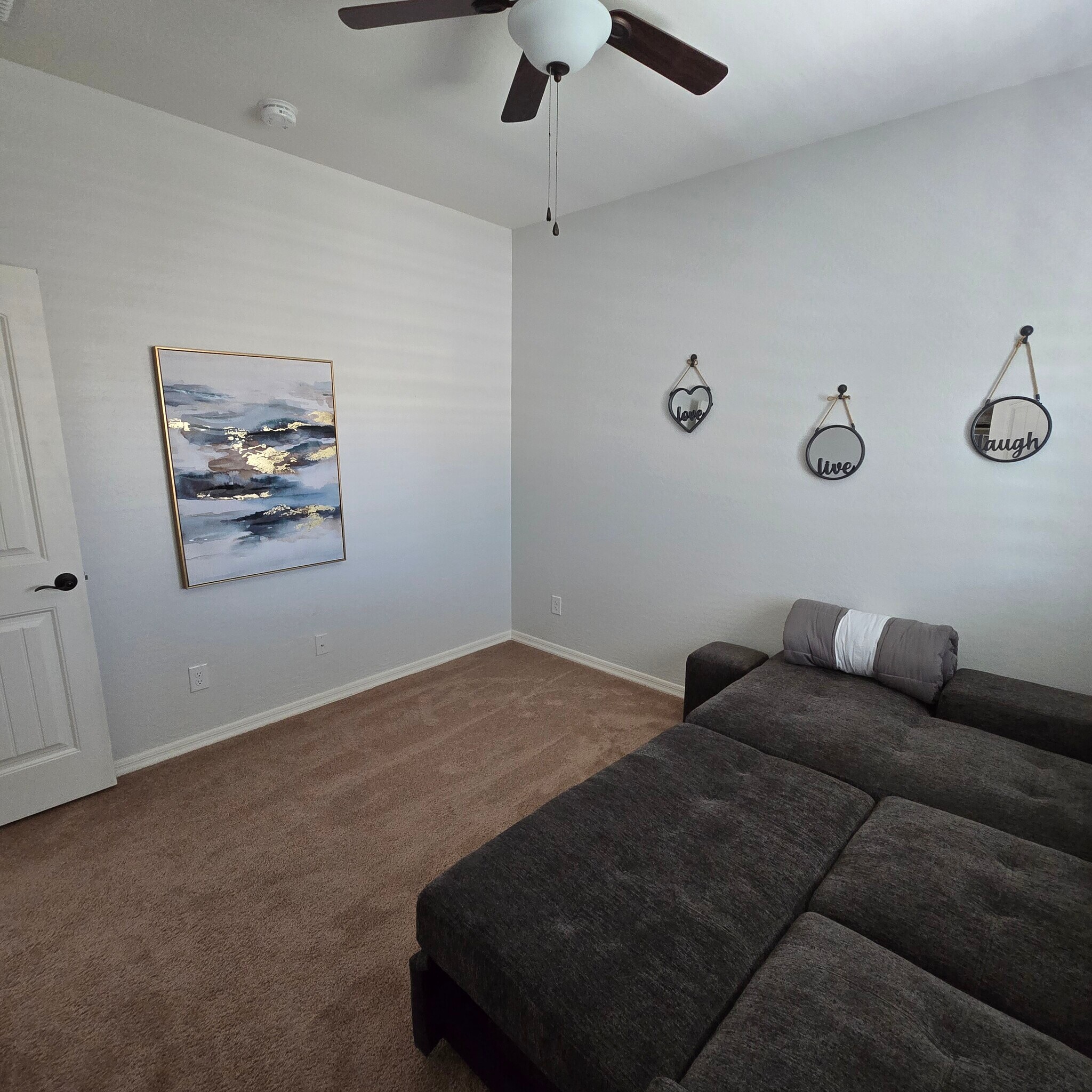 Guest room with convertible couch bed - 280 E Indigo Dr
