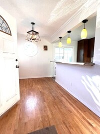 Building Photo - Private Back House with single garage & yard