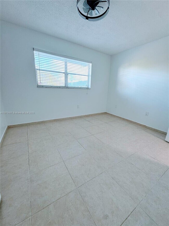 Building Photo - 8110 Sunrise Lakes Blvd