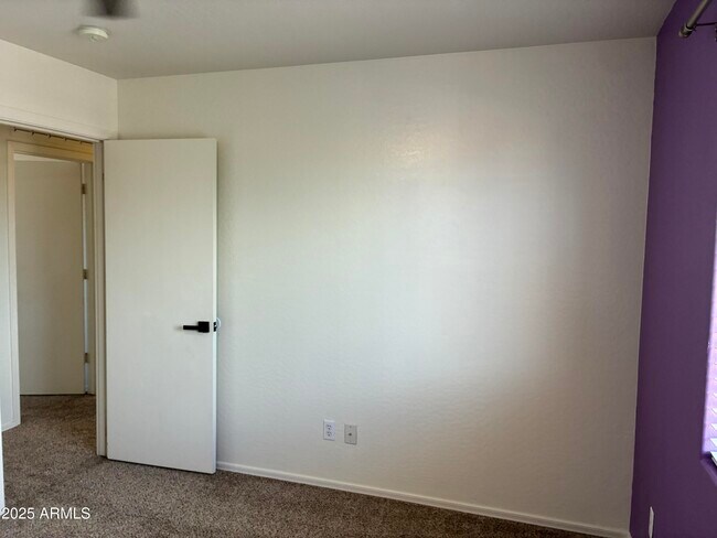 Building Photo - 7287 S Sunrise Way