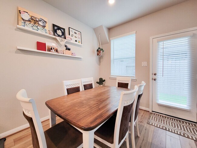 Building Photo - A true gem on a quiet corner lot, this spacious and sun-filled home is tucked away from street no...