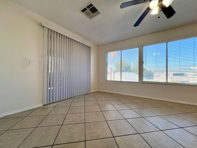 Building Photo - Spacious 3-bedroom, 2-bath condo with acce...