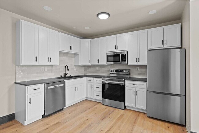 Building Photo - For Rent: Renovated 2-Story Townhouse in M...