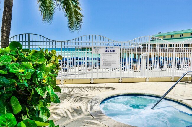 Building Photo - 16699 Collins Ave