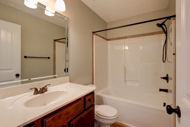 Building Photo - Fantastic Open Floor Plan Home With Stone Front Fireplace, Stainless Steel Appliances, And Close ...