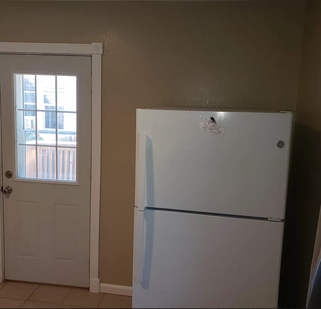 Full Kitchen & Door to Back Deck - 709 N Rowley St