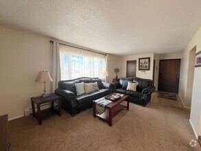 Building Photo - Furnished Month to Month Corporate Short T...
