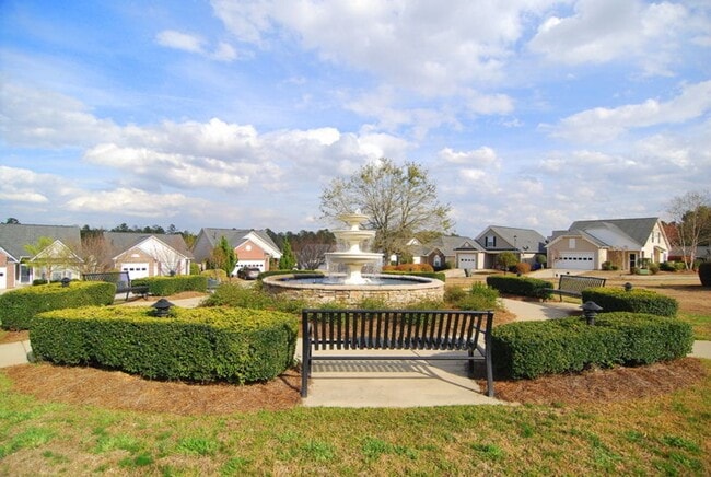 Building Photo - TWO BEDROOM GARDEN HOME IN GATED COMMUNITY