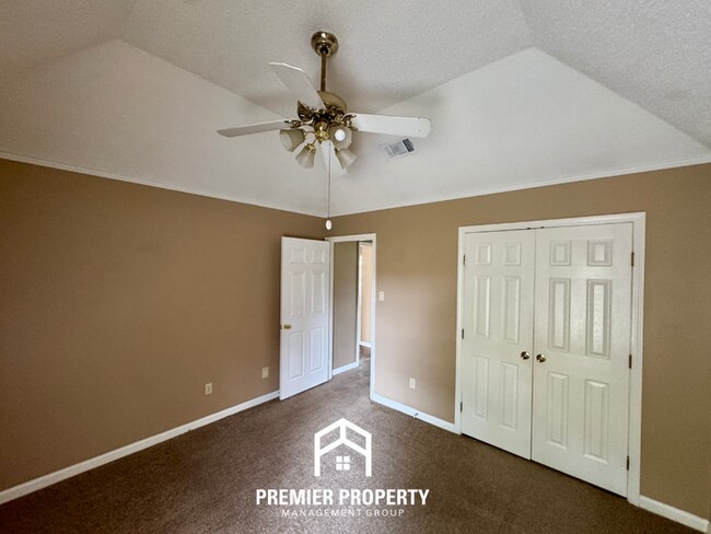 Building Photo - Spacious 3BR/2BA Near Southwind | 1,958 Sq Ft, Brick Fireplace, 2-Car Garage & Quiet Cove