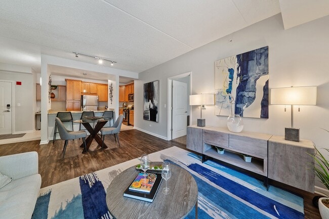 Modern living room with open layout and vibrant decor - The Easton Downers Grove