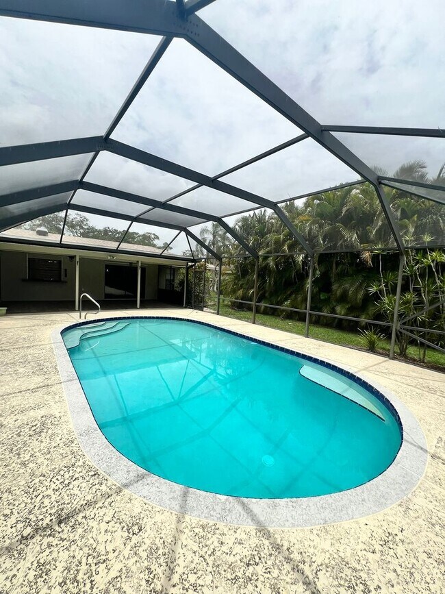 Building Photo - BEAUTIFUL 3 BEDROOM POOL HOME IN SANDPIPER...