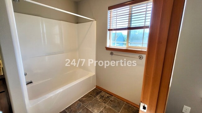 Building Photo - *FIRST MONTH FREE* Charming 4 BD | 2.5 BA ...