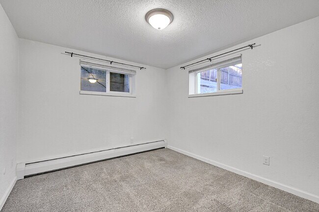 Building Photo - $1,320.95 with FIRST FULL MONTH'S FREE RENT  - 2 Bedrooms, 1 Bathroom, Condo in Denver with Cozy ...