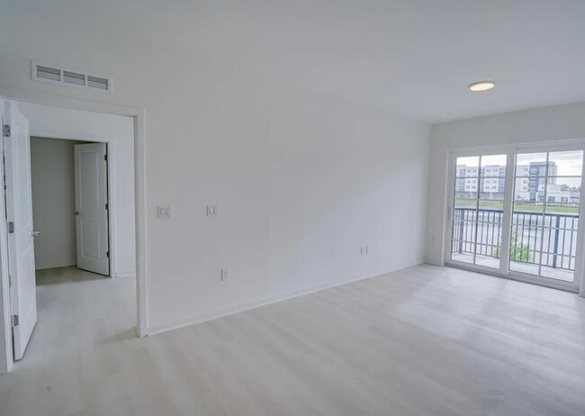 Building Photo - Top Floor Corner Unit – Brand New 3/2 Condo with Balcony in Millenia Park *** Only $1995/mo ***