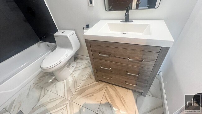 Building Photo - FLATLANDS 4 STREET