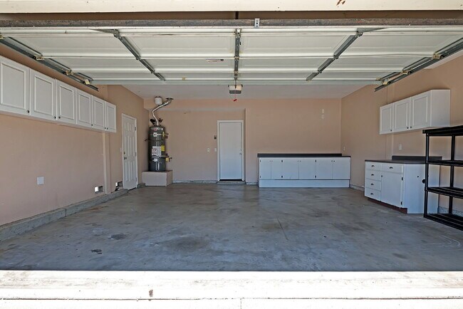 Building Photo - The Woodland Rental You've Been Looking For