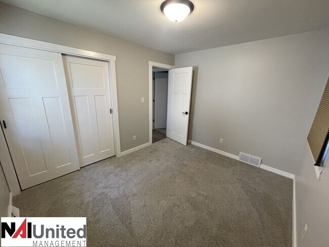 Building Photo - Three bed, one and a half bath home for rent