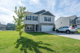 Building Photo - Newly built 3 bedroom and 2.5 bath home with garage.