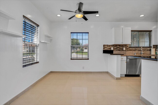 Building Photo - Stunning Remodeled Corner-Lot Home – An En...