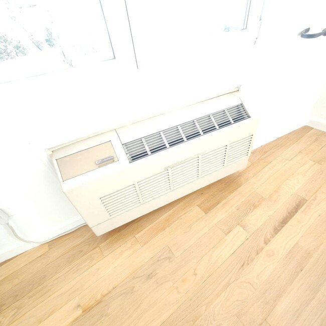 Building Photo - 66-83-83 70th St