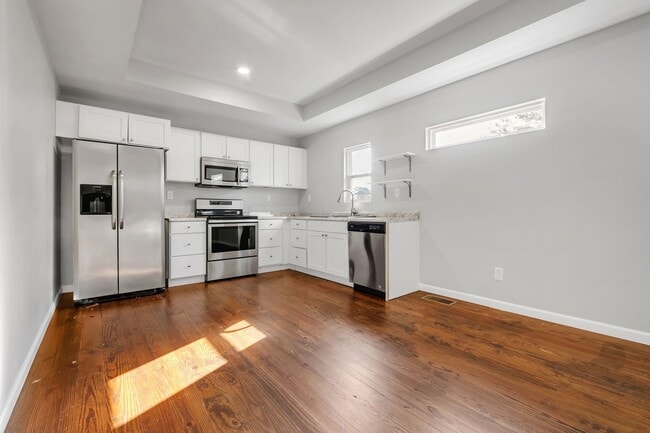 Building Photo - Modern Comfort Meets Prime Location — Stylish 2-Story Townhome