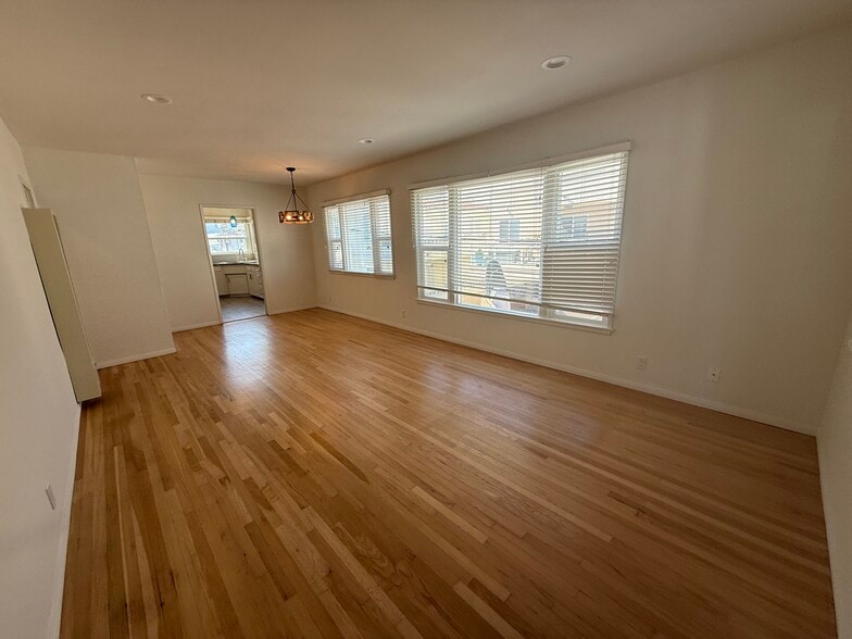 Open Living room and Dining Area with large windows and lots of light! - 811 S Catalina Ave