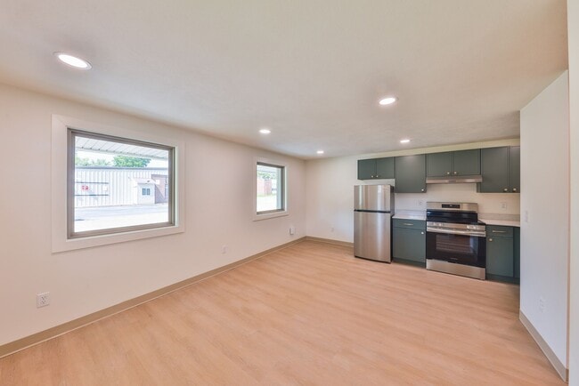 Building Photo - Modern Remodel with Designer Finishes | All Utilities Included