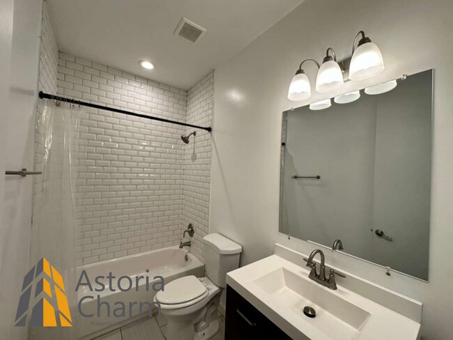 Building Photo - Beautifully Renovated 3BR Rowhome Near Johns Hopkins – Gated Parking + Modern Upgrades