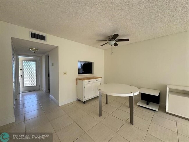 Building Photo - 6700 Royal Palm Blvd