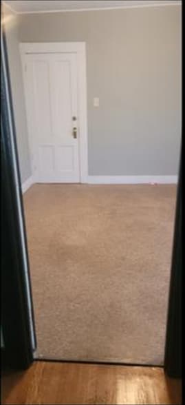 Private bedroom (approx. 11’ x 11’). New flooring being installed. - 41 Russell St
