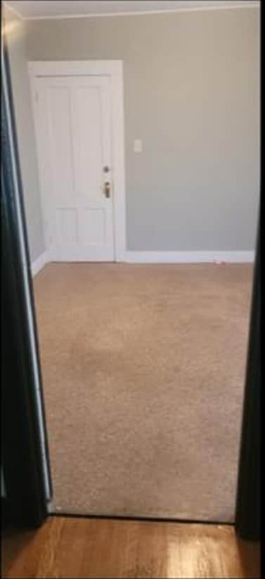 Private bedroom (approx. 11’ x 11’). New flooring being installed. - 41 Russell St