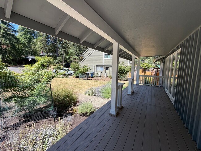 Building Photo - Spacious 4BR/3BA Home with Deck, Fenced Yard & Garage