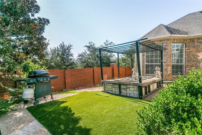 Building Photo - 9028 Bottlebrush Ln