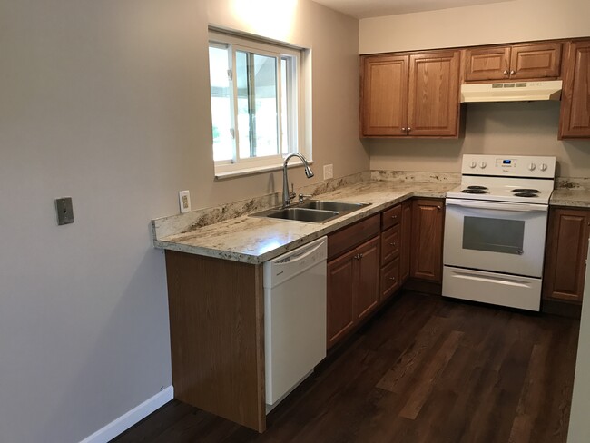 new cabinets, counter top, paint, flooring, appliances - 4797 Lorraine Ave