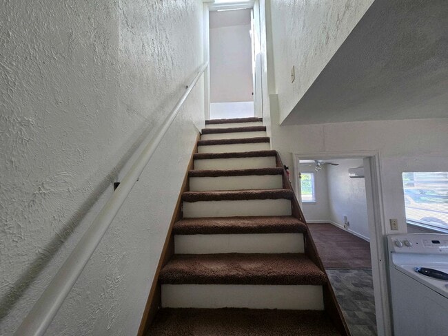 Building Photo - Cozy 2 Bed, 2 Bath Home with Parking Spaces and a Fenced Backyard!