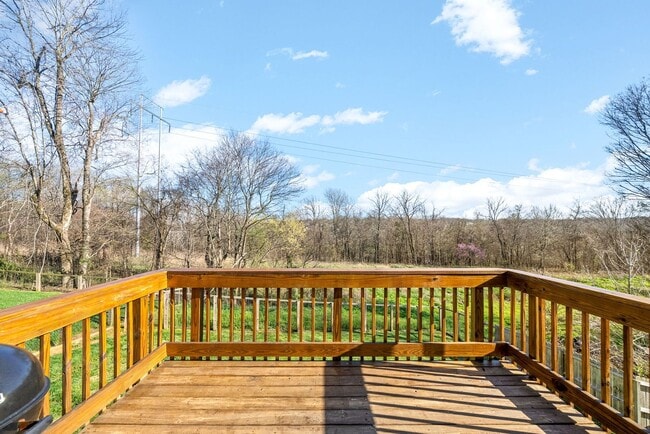 Building Photo - Pet Friendly Three Bedroom with Bonus!