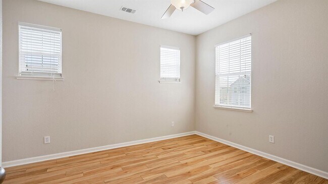 Building Photo - ADORABLE 4 BED/2.5 BATH TOWNHOME WITH CORNER LOT AND LARGE FENCED REAR YARD WITH PATIO