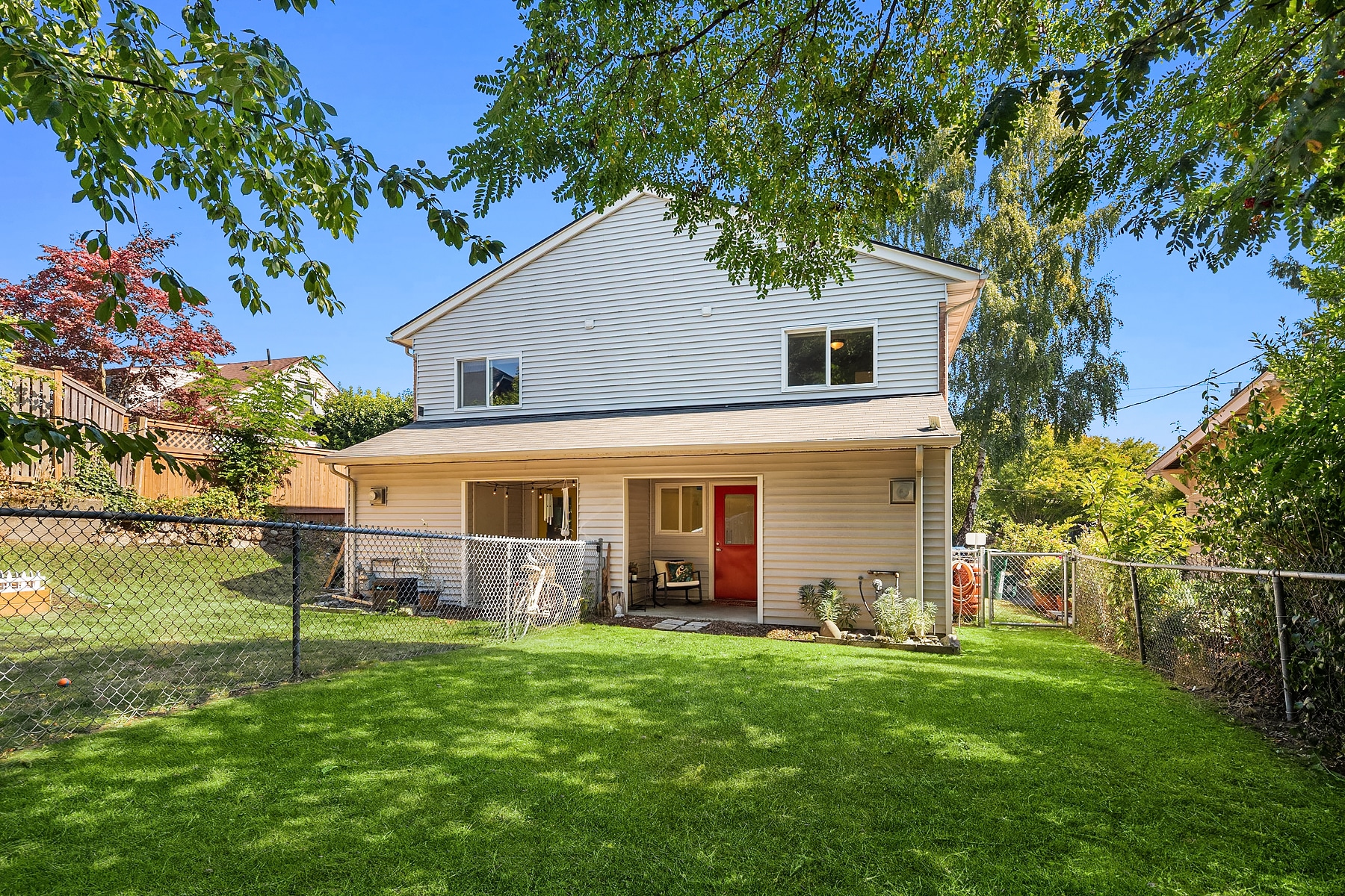 Each side has it's own dedicated back yard. - 7051 8th Ave NW