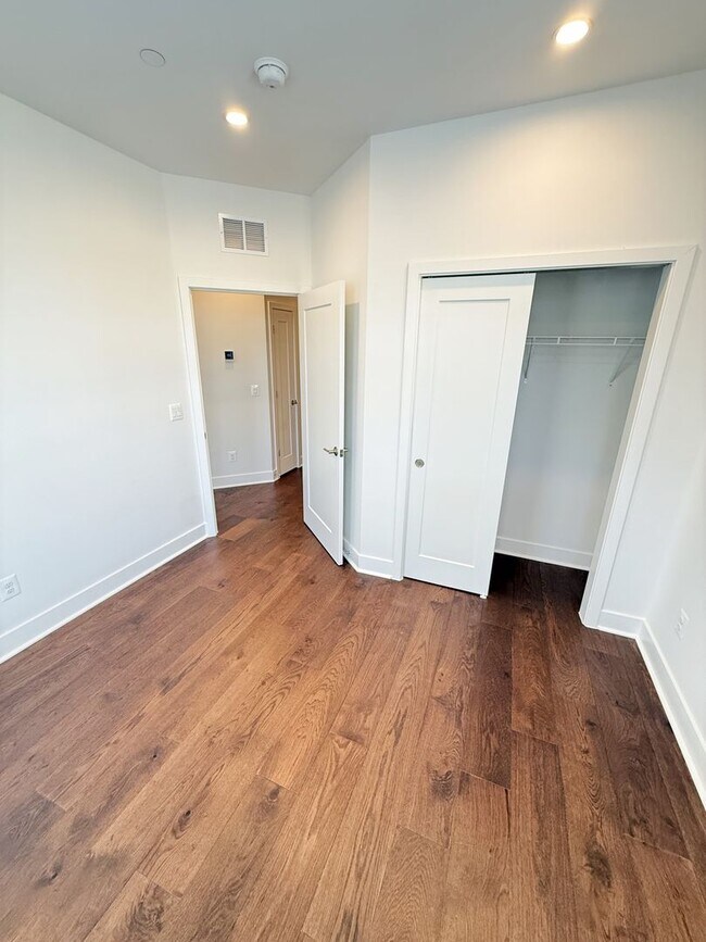 Building Photo - Brand new 4 level, 4 Bedroom Townhome with Elevator!