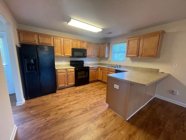 Building Photo - PRE-LEASING FOR AUGUST 2026!