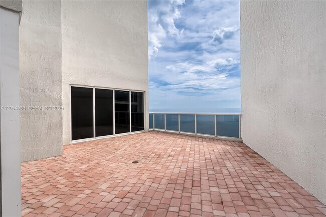 Building Photo - 19111 Collins Ave
